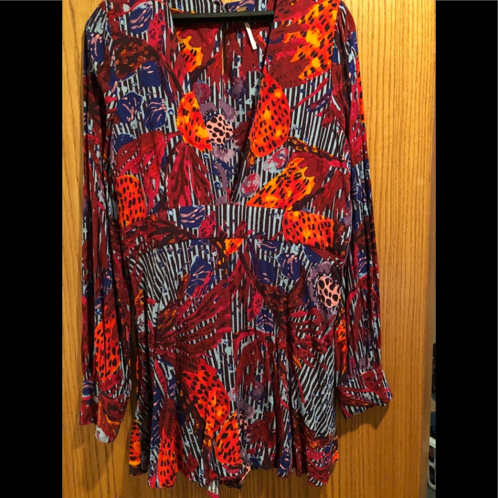 Free People Romper. Beautiful colors and like new.